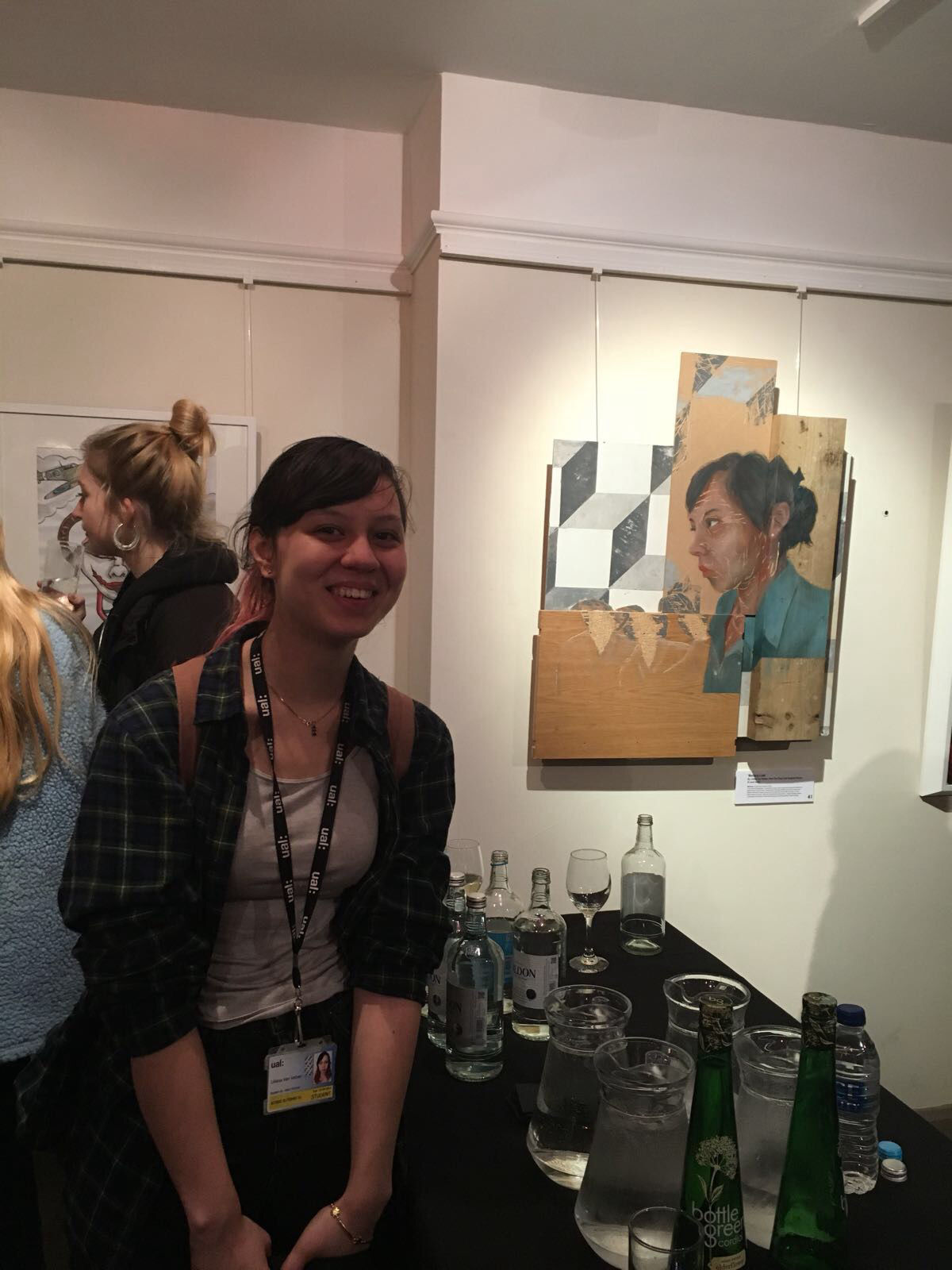 Liliana van Velzen with her self portrait at Tanya Baxter Contemporary